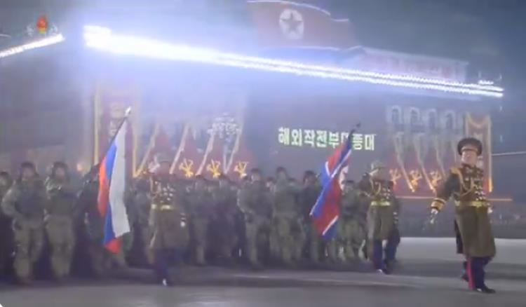 Фото для новини:Військові КНДР йшли на параді під прапором РФ: Україна іронічно відповіла